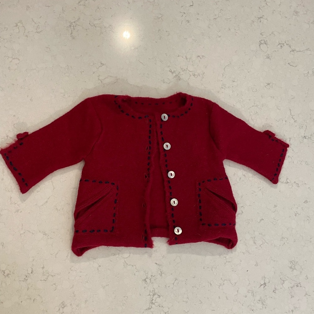 6-12 months boiled wool mother or Pearl buttons